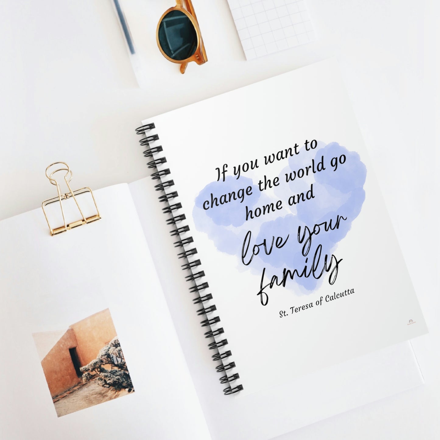 Change the world, go home and love your family. St. Teresa of Calcutta, Spiral Notebook - Ruled Line